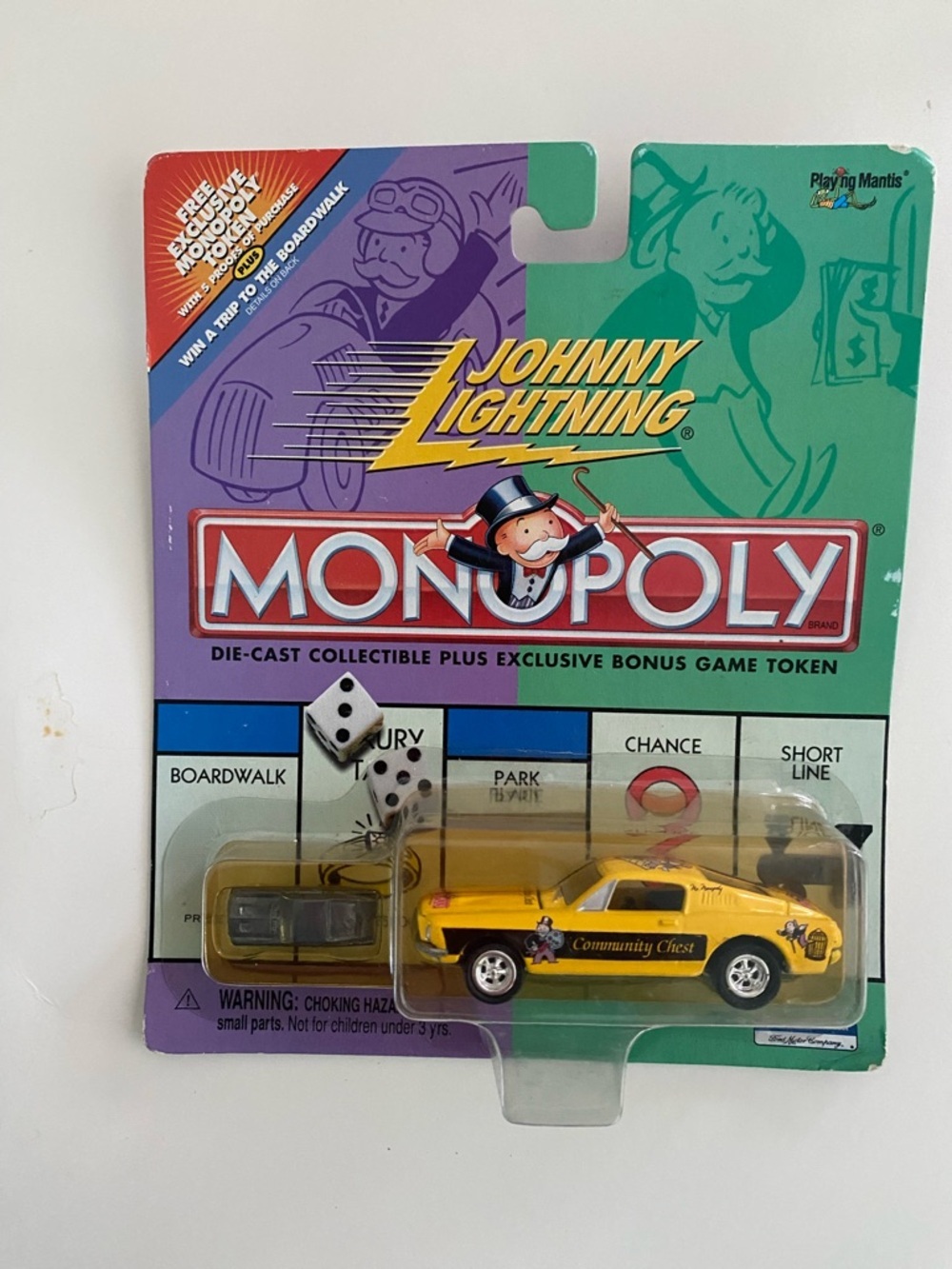 Johnny Lightning Monopoly Community Chest Yellow Die-Cast Car